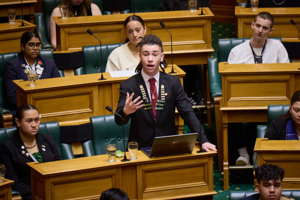 Thomas Brocherie is picture mid-debate in the Parliament Debating Chamber in Wellington